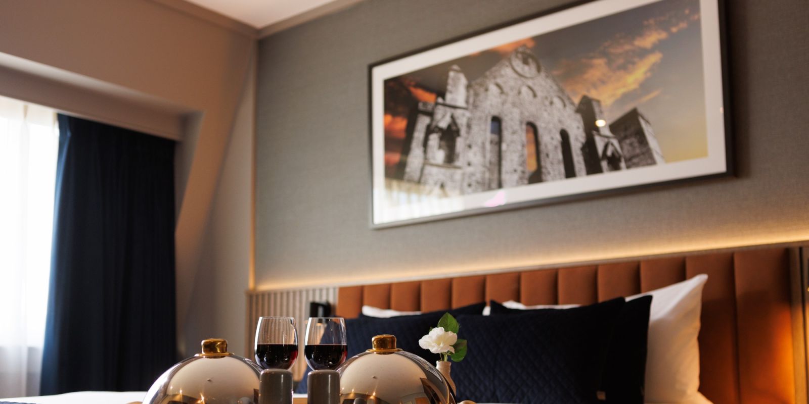 Rooms Service Tray on Bed with pic of Rock of Cashel in background